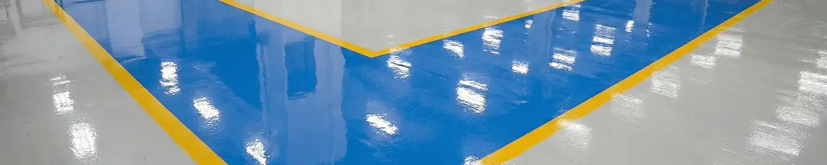 A factory floor professionally covered and marked with epoxy flooring in Fort Wayne, IN