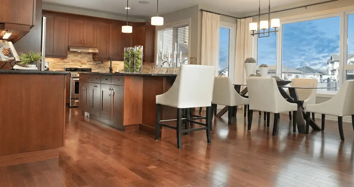 A modern kitchen with professionally installed wood flooring in Fort Wayne, IN