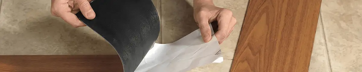 A professional installing vinyl flooring in Fort Wayne, IN